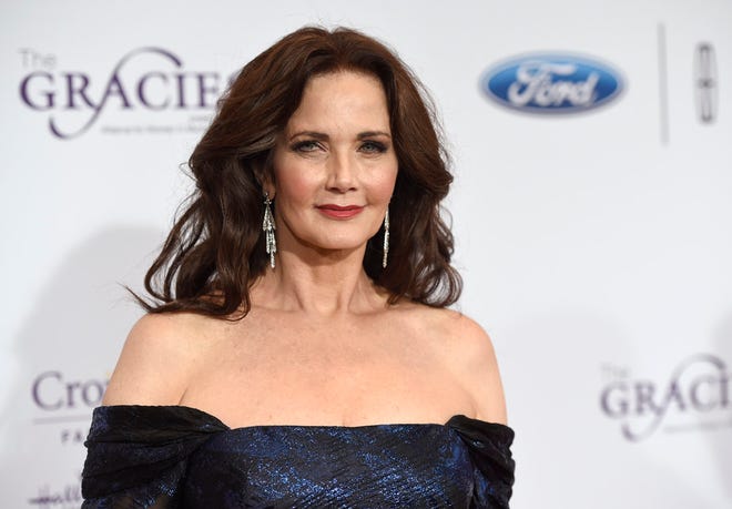 FILE- In this May 24, 2016, file photo, Lynda Carter arrives at the 41st annual Gracie Awards Gala at the Beverly Wilshire Hotel in Beverly Hills, Calif. Carter has confirmed reports that she has been cast as the president in the second season of the CW series, "Supergirl."(Photo by Chris Pizzello/Invision/AP, File)