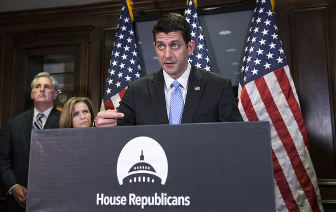 House Speaker Paul Ryan of Wis., joined at left by House Majority Leader Kevin McCarthy of Calif., and Rep. Lynn Jenkins, R-Kan., meets with reporters at Republican National Committee headquarters on Capitol Hill in Washington, Tuesday, May 24, 2016, following a closed-door caucus. On the cusp of the Memorial Day weekend, Ryan called the recent remarks of Veterans Affairs Secretary Robert McDonald as "disgusting" after comparing wait times to receive VA health care to the hours people wait for rides at Disney theme parks. (AP Photo/J. Scott Applewhite)