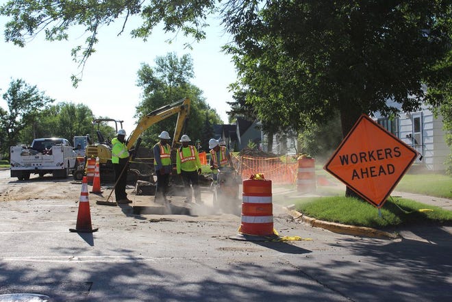 On Thursday morning, workers from Murphy Pipeline open another section of Fifth Street NE in Devils Lake.