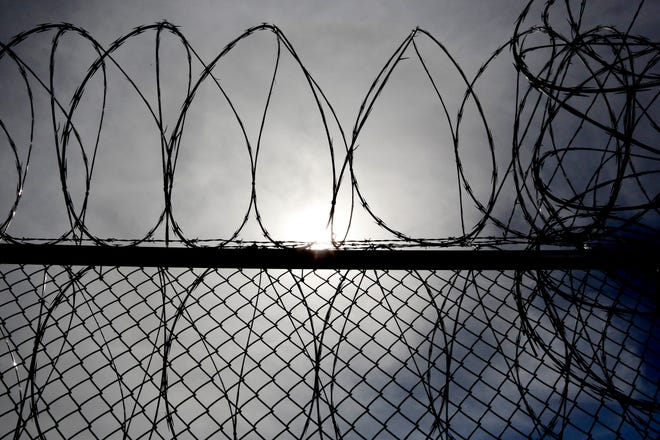 Razor wire is on many of at the North Fork Correctional Center in Sayre, Okla. [Kurt Steiss/The Oklahoman]