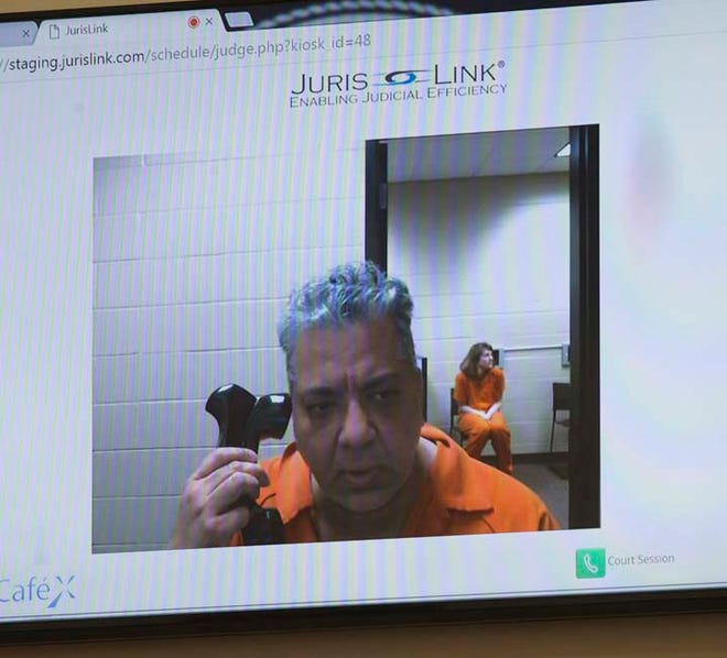 Dr. Sanjay Kumar appears during Craven County Superior Court via video conference from the county jail. The New Bern doctor faces drug and other charges.