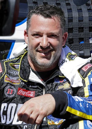 Tony Stewart speaks during an interview after winning the NASCAR Sprint Cup Series race Sunday in Sonoma, Calif. (AP Photo/Ben Margot)