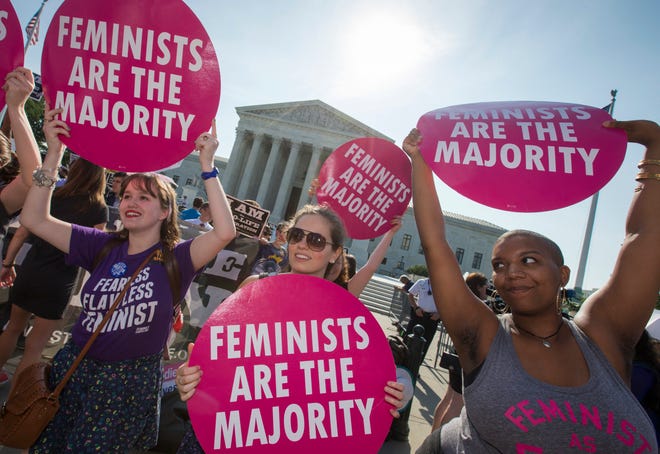 Activists demonstrate in front of the Supreme Court in Washington, June 27, 2016, as the justices close out the term with decisions on abortion, guns, and public corruption expected. (AP Photo/J. Scott Applewhite)