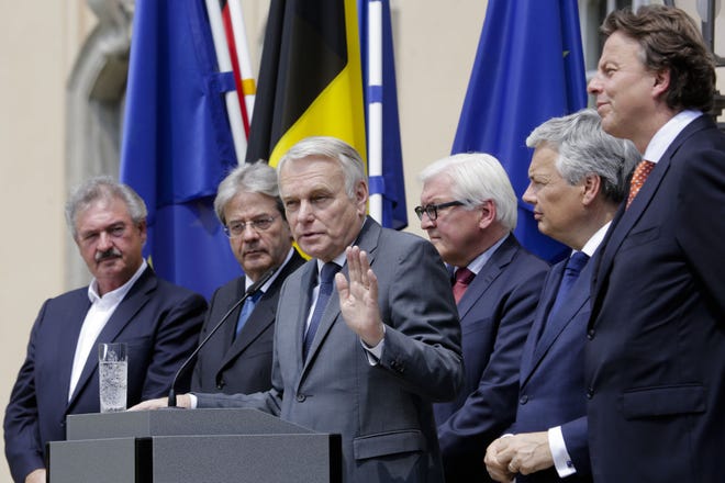 The foreign ministers from EU's founding six, Jean Asselborn from Luxemburg, Paolo Gentiloni from Italy, Jean-Marc Ayrault from France, Frank-Walter Steinmeier from Germany, Didier Reynders from Belgium and Bert Koenders from the Netherlands, brief the media after a meeting on the so-called Brexit in Berlin, Germany, on Saturday.