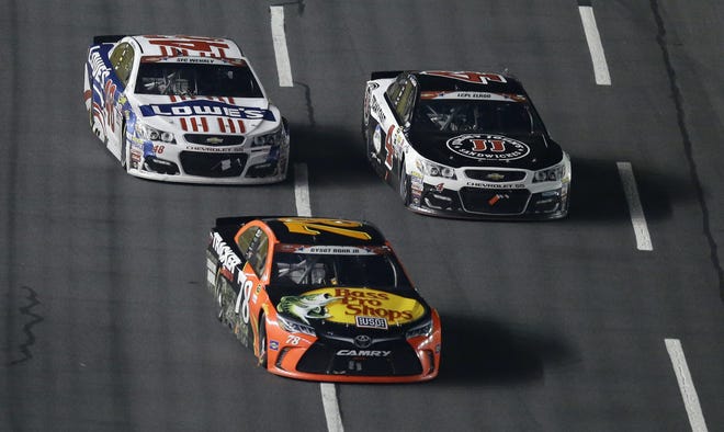 XFINITY Series drivers will honor the military Friday night much like Sprint Cup drivers did last month in Charlotte. (AP Photo/Gerry Broome)