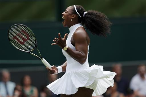 Serena Williams of the U.S celebrates a point against Amara Safikovic of Switzerland during their women's singles match on day two of the Wimbledon Tennis Championships in London, Tuesday, June 28, 2016. (AP Photo/Ben Curtis)