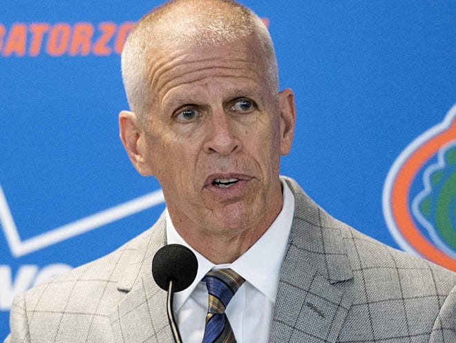 In this Dec. 6, 2014, file photo, Florida athletic director Jeremy Foley speaks to the media during a press conference in Gainesville, Fla. Foley, one of the most successful college sports leaders in the country the last 25 years, is retiring. The school announced his decision Monday, June 13, 2016, saying Foley will officially step down Oct. 1.