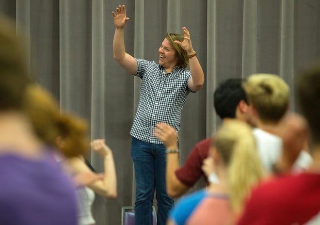 Cole Blume, the associate director of the Stangeland Family Youth Choral Academy at the Bach Festival, leads their first rehearsal at the Berlinger Annex on the campus of the University of Oregon. (Brian Davies/The Register-Guard)