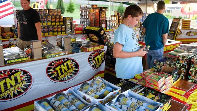 It’s illegal to set off fireworks without a permit in Florida — so why is it relatively easy to buy fireworks in the state? (Mike Lawrence/The Gleaner via AP)