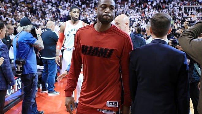 TORONTO, ON - MAY 15: Dwyane Wade #3 of the Miami Heat walks off the court following Game Seven of the Eastern Conference Quarterfinals against the Toronto Raptors during the 2016 NBA Playoffs at the Air Canada Centre on May 15, 2016 in Toronto, Ontario, Canada. NOTE TO USER: User expressly acknowledges and agrees that, by downloading and or using this photograph, User is consenting to the terms and conditions of the Getty Images License Agreement. (Photo by Vaughn Ridley/Getty Images)