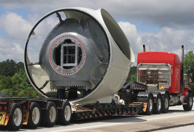 A rotor hub for a massive wind turbine is trucked through Havelock. Parts for the 104, 500-foot-tall wind turbines are being shipped from the North Carolina Port at Morehead City through Havelock to the Amazone Wind Farm U.S. East project in Pasquotank and Perquimans counties.
