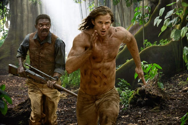 This image released by Warner Bros. Entertainment shows Samuel L Jackson, left, and Alexander Skarsgard in a scene from "The Legend of Tarzan." (Jonathan Olley/Warner Bros. Entertainment via AP)