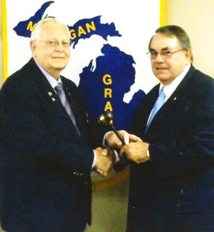 UCT International President, Tom Hoffman, Texas, congratulates Dave McKay after his installation as Michigan Regional (state) President. Courtesy Photo