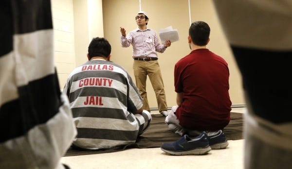 Mehmet Soyer, Raindrop Foundation Director/Dallas, speaks to Dallas County Jail Muslim inmates and others after praying during the holy Muslim fasting month of Ramadan on June 17, 2016 in Dallas. (David Woo/The Dallas Morning News/TNS)
