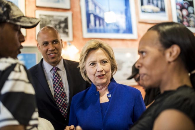 Sen. Cory Booker, D-N.J., joined Hillary Clinton on the campaign trail in Newark in June. Washington Post photo by Melina Mara