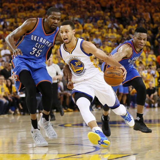 Kevin Durant guards Steph Curry in Game 7 of the Western Conference finals. (Photo by Nate Billings)