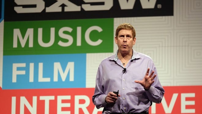 MARCH 13, 2015 - Hugh Forrest, director of the South by Southwest Interactive Festival gives the opening remarks during the first day of the festival held at the Austin Convention Center in Austin, Tx., on Friday, March 13, 2015.  (RODOLFO GONZALEZ / AMERICAN-STATESMAN)