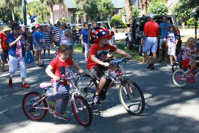 Thomas Reimer/For Bluffton Today Local children and their families celebrated the Fourth of July by taking part in Monday's parade down Calhoun Street.