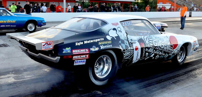 Here’s a photo of the author’s 1970 Camaro Pro class bracket racing machine, powered by a modified 434-inch small block Chevy. It accelerates to 114-mph in 6.0 seconds on a 660-ft. eighth-mile drag strip. Greg gives some tips to an aspiring young racer “wanna be.” (Photo compliments of Skyview Drags)