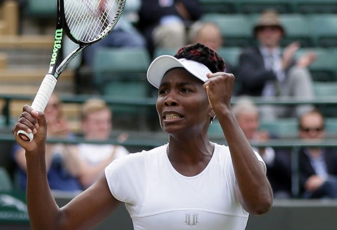 Venus Williams raises her fists in triumph after beating Yaroslava Shvedova in the quarterfinals at Wimbledon on Tuesday.