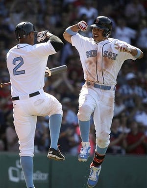 Mookie Betts (right) and Xander Bogaerts each earned their first All-Star game selection when the rosters were announced on Tuesday. AP Photo/Steven Senne
