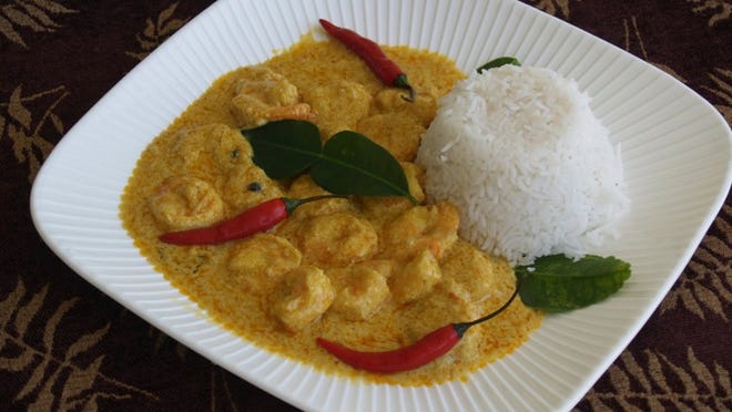 Coconut shrimp curry, made with wild-caught Louisiana shrimp, and the added flavor of Kaffir lime leaves, is served with cooked basmati rice. Contributed by Gholam Rahman