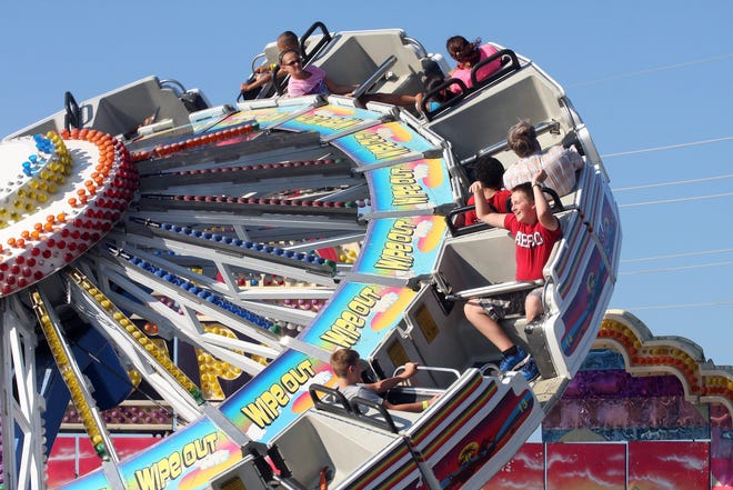 Riders on the Wipeout ride enjoy the 2013 Stephenson County Fair in Freeport. RRSTAR.COM FILE PHOTO