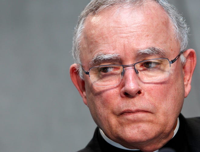 FILE - In this June 25, 2015, file photo, Philadelphia's Archbishop Charles Joseph Chaput attends a news conference at the Vatican. The leader of the Roman Catholic Archdiocese of Philadelphia said divorced and remarried parishioners should abstain from sex and live "like brother and sister" if they want to receive Holy Communion and haven't had their previous marriage annulled. Chaput issued a new set of pastoral guidelines for clergy and other leaders in the archdiocese that went into effect July 1, 2016. (AP Photo/Riccardo De Luca, File)