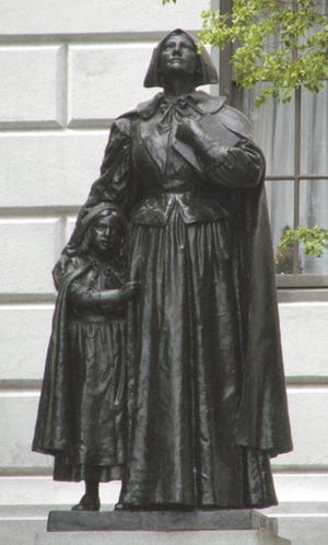 This statue of Anne Hutchinson, one of the founders of Portsmouth, stands outside the Massachusetts State House in Boston.