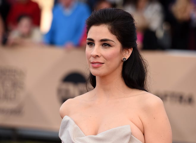FILE - In this Jan. 30, 2016, file photo, Sarah Silverman arrives at the 22nd annual Screen Actors Guild Awards at the Shrine Auditorium & Expo Hall in Los Angeles. Silverman said in a Facebook post on July 7, 2016, she underwent surgery recently for epiglottitis and spent a week in the intensive care unit. (Photo by Jordan Strauss/Invision/AP, File)