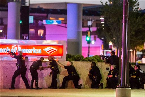 Dallas Police respond after shots were fired at a Black Lives Matter rally in downtown Dallas on Thursday, July 7, 2016. Dallas protestors rallied in the aftermath of the killing of Alton Sterling by police officers in Baton Rouge, La. and Philando Castile, who was killed by police less than 48 hours later in Minnesota. (Smiley N. Pool/The Dallas Morning News)
