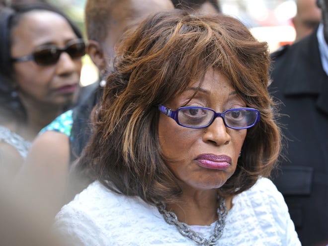 Fifth District Congresswoman Corrine Brown surrounded by the media and supporters outside the Federal Courthouse in Jacksonville after her indictment Friday.