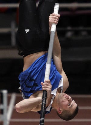 Freeport native Mark Hollis, shown vaulting 18 feet, 4 inches at the 2010 Millrose Games, missed qualifying for the Olympics by one spot, finishing fourth at the U.S. Trials on Monday. ASSOCIATED PRESS FILE PHOTO