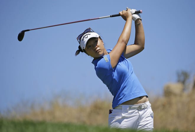 World No. 1 Lydia Ko follows her shot from the sixth tee during the third round of the U.S. Women's Open in San Martin, Calif. Ko will enter the final round in the lead. AP Photo