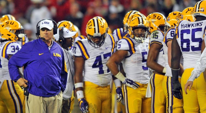LSU is expected to be one of the better teams in the nation this upcoming season, but if the Tigers begin to fall off the mark, expect coach Les Miles, left, to again occupy the hot seat. Dave Hyatt/Gadsden Times