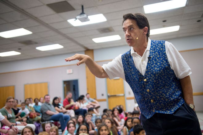 Magic Jim, who travels to schools and libraries with Educational Productions, performs for children and parents at the Mount Laurel Library.