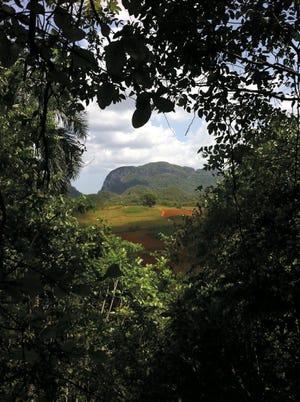 A three-hour hike from the town of Viñales takes visitors through Cueva de la Vaca, a rock-lined passageway to the Viñales Valley and its acres of tobacco fields, dirt paths and stogie-chomping farmers on horseback. Located about 112 miles west of Havana, Viñales Valley was named a UNESCO World Heritage Site for its unique topography, reliance on traditional methods of agriculture and the blending of indigenous Spanish and African cultures.