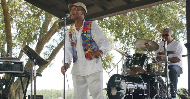 Tory Wynter performs on stage with his band at the Lakeridge Winery & Vineyards Summer Music Series on Saturday in Clermont. (LINDA CHARLTON/CORRESPONDENT)