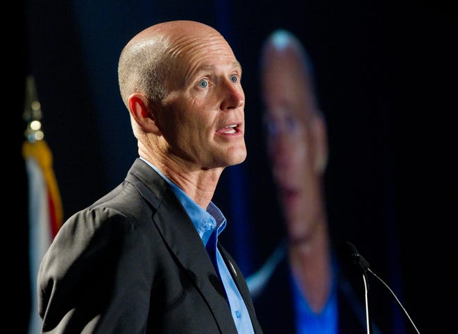 Florida Gov. Rick Scott will be attending the Farnborough International Airshow just outside of London, England, to drum up business for the Sunshine State.
 (AP Photo/J Pat Carter, File)