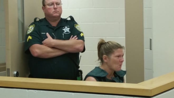 Tracie Jo Naffziger, charged with accessory after the fact to second-degree murder, appears in court Sunday morning in Tavares. MILLARD IVES / DAILY COMMERCIAL