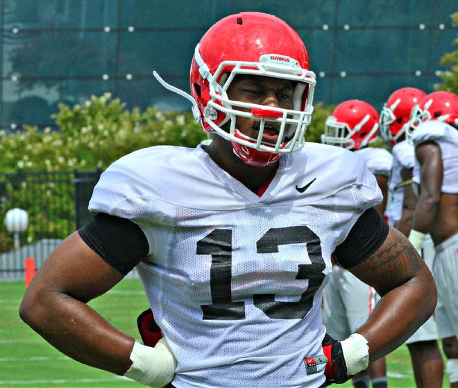Georgia defensive lineman Jonathan Ledbetter (13) looks on during the Bulldogs' session on the Woodruff Practice Fields on Friday, Aug. 7, 2015, in Athens, Ga. (Photo by Steven Colquitt)