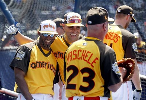 American League's Eduardo Nunez, of the Minnesota Twins, left, and Carlos Beltran, of the New York Yankees, laugh during batting practice prior to the MLB baseball All-Star Home Run Derby, Monday, July 11, 2016, in San Diego. (AP Photo/Lenny Ignelzi)