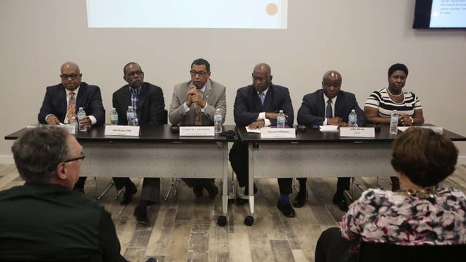 The Urban League of Palm Beach County hosted a Police & Community Relations Town Hall Meeting in West Palm Beach Monday, July 11, 2016. From left to right are attorney Richard Ryles, psychologist Paul Bryan, PhD, president and CEO Patrick J. Franklin, Riviera Beach Police Department Chief Clarence Williams, attorney John Howe, and Clarice Redding of the Urban League Young Professionals. (Bruce R. Bennett / The Palm Beach Post)