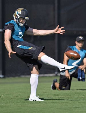 Jacksonville Jaguars punter Brad Nortman performs a kicking drill on May 23 during organized team activities at the Florida Blue Health and Wellness Practice Fields near EverBank Field.