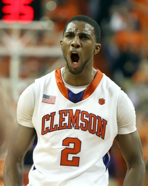 Clemson's Demontez Stitt yells after an assist led to a three-point basket by the Tigers during an NCAA college basketball game against Miami at Littlejohn Coliseum in Clemson, S.C. on Saturday, Feb. 13, 2010. Clemson won, 74-66. (AP Photo/Anderson Independent-Mail, Mark Crammer)