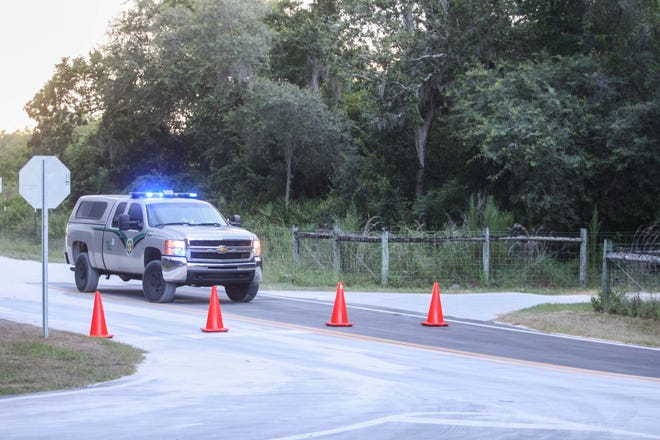 Florida Fish and Wildlife Conservation Commission patrol at the entrance of the Blue Spring State Park for a missing kayaker on Thursday, July 14, 2016. News-Journal / LOLA GOMEZ
