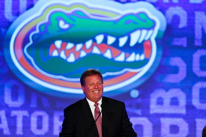 Florida coach Jim McElwain speaks to the media at the Southeastern Conference football media days on Monday in Hoover, Ala. (AP Photo/Brynn Anderson)