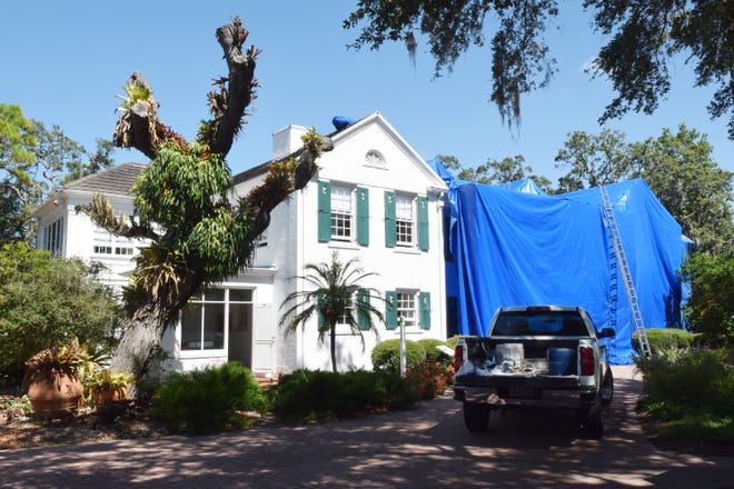 Workers from Cloud Termite and Pest Control of Bradenton tent the Christy Payne Mansion at Marie Selby Botanical Gardens in Sarasota, Florida on Thursday, July 14, 2016. The house is located at the corner of Palm Avenue and Bayfront Drive.