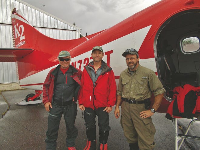 From left, Kevin Downing, Rod Merys and Eric Summers standing in front of the plane, a DeHaviland Beaver, that is about to take them from Talkeetna in Alaska to the glacier at 7,200 feet on Denali for the beginning of the trip.