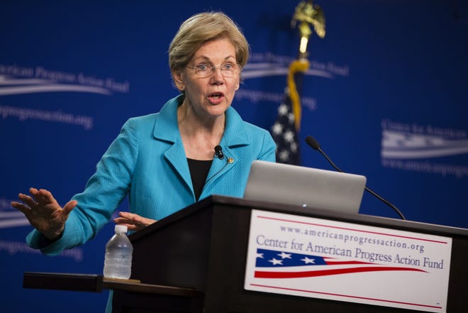 Sen. Elizabeth Warren, D-Mass. peaks to the Center of American Progress Action Fund, Wednesday, July 13 in Washington. AP Photo/Evan Vucci